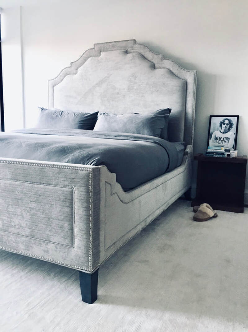 This bedroom bamboo silk rug from ABC Carpet & Home is beautifully proportioned under the Safavieh Couture bed and the Design Within Reach bedside table and gives that luxurious feeling when you step out of bed in the mornings